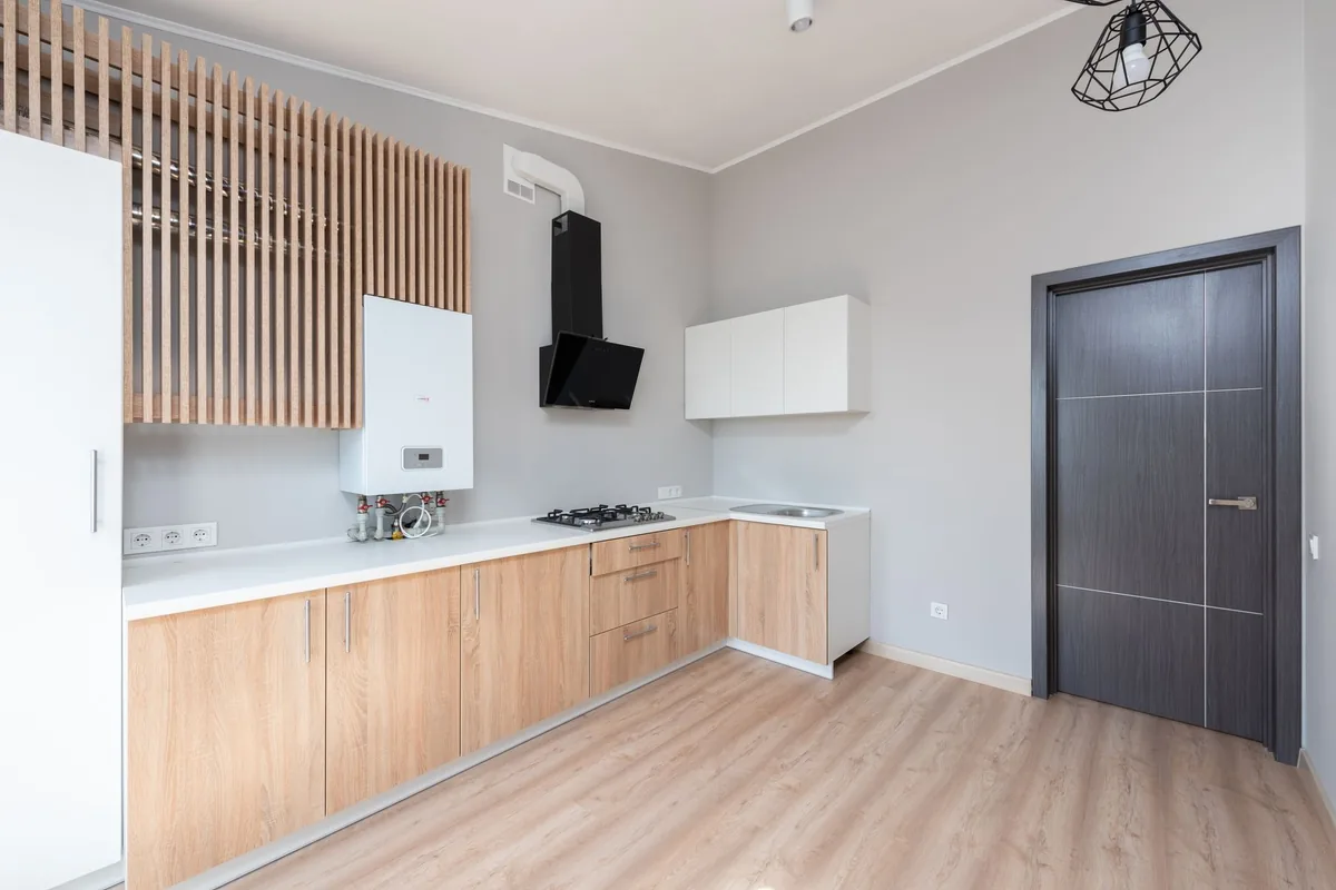 Cuisine rénovée où l'extraction doit être coordonnée à la ventilation générale