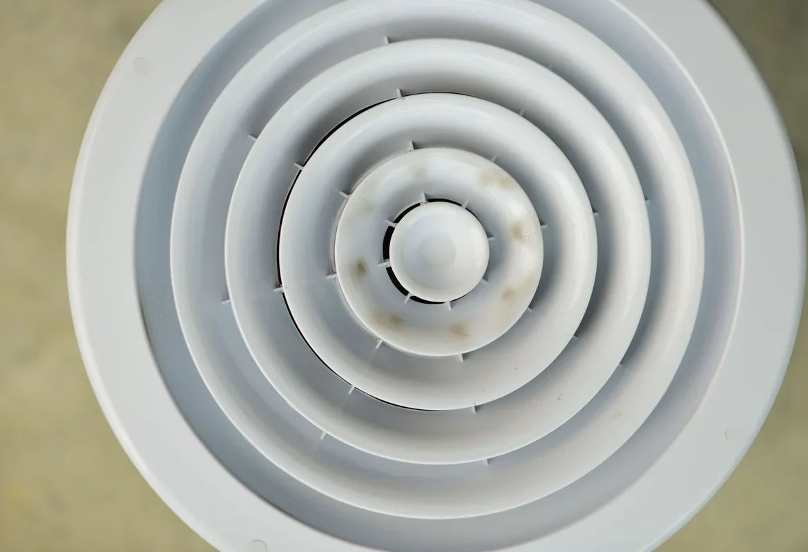 Bouche circulaire d'extraction d'air d'un système de ventilation